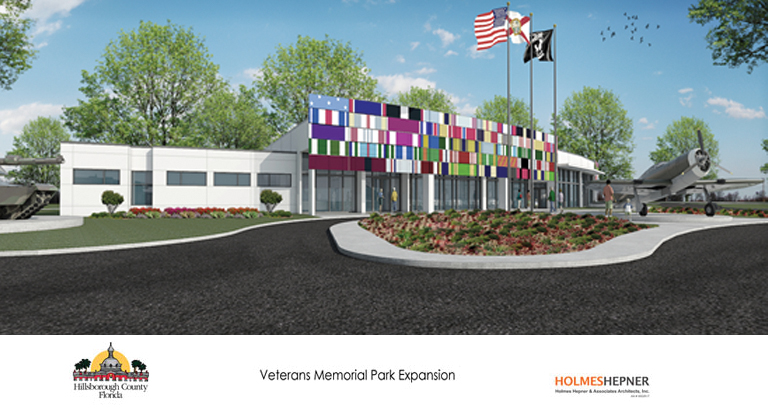 Concept drawing for Veterans Memorial Park Expansion, featuring a white building, large driveway with massive flag poles, tanks, helicopters and retired army equipment scattered throughout the grounds