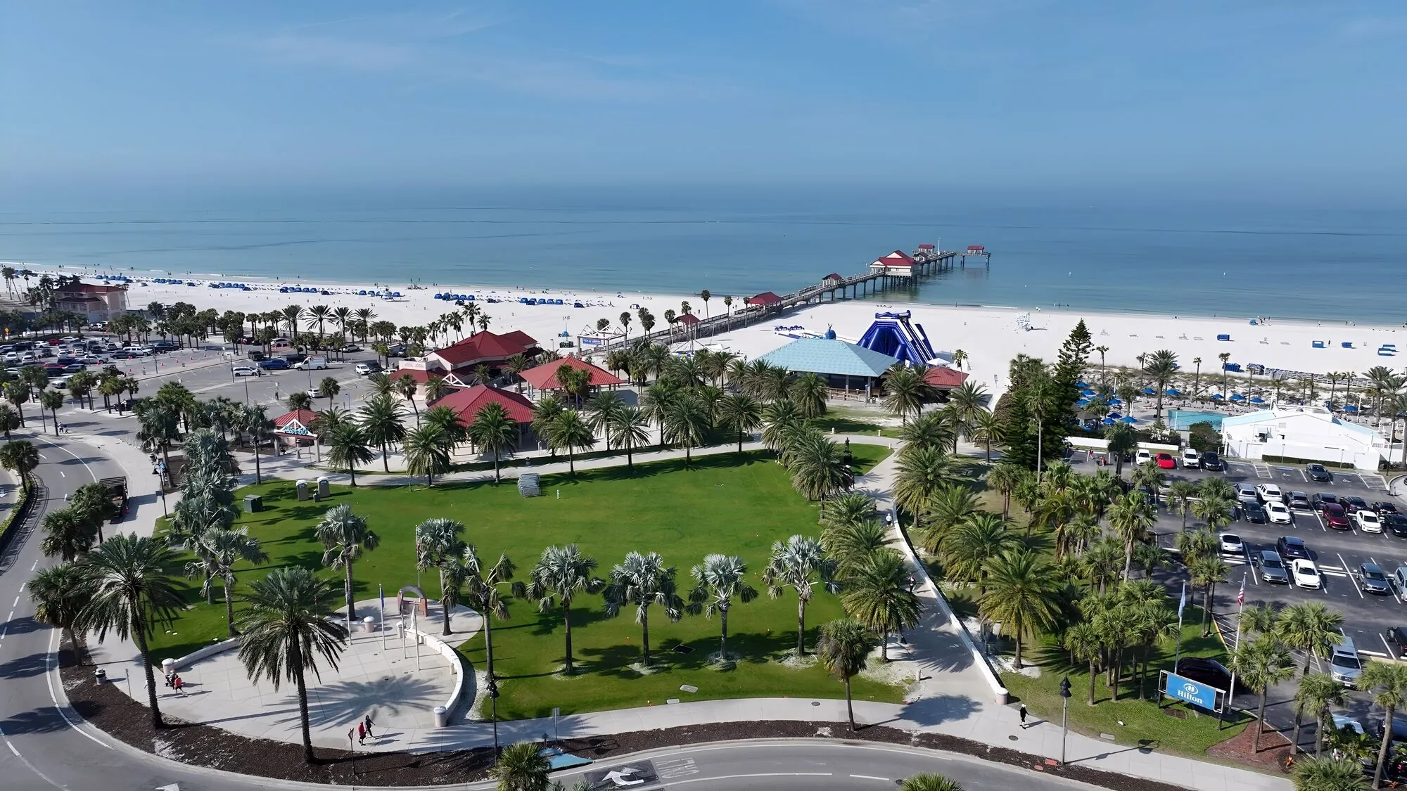 Aerial view of a Clearwater beach, pier and waterfront park