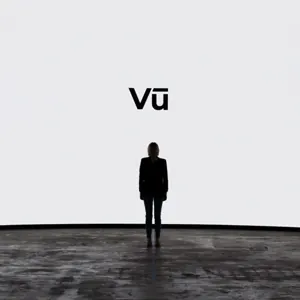 Vu logo above a lone silhouetted figure on a gray reflective floor