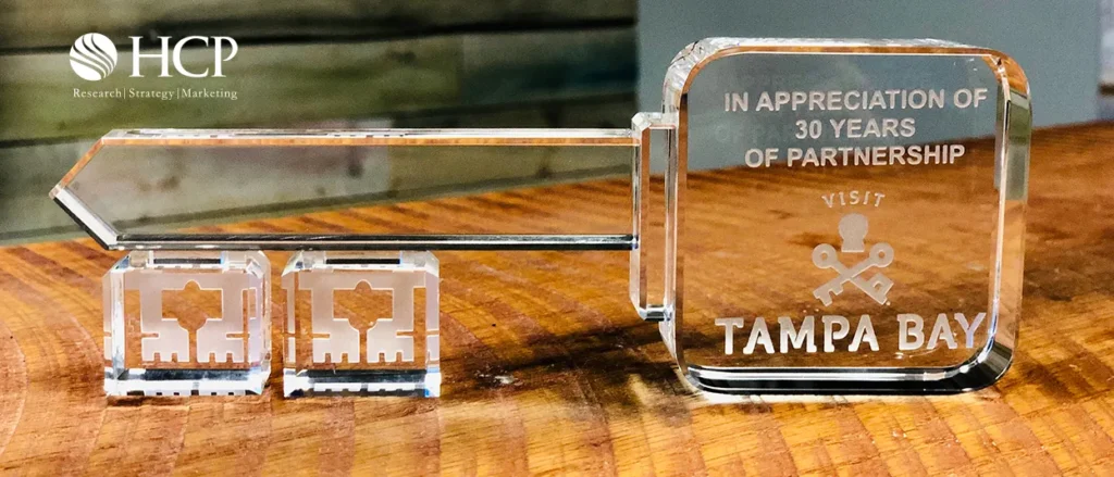 Crystal key award reading In Appreciation of 30 Years of Partnership, Visit Tampa Bay