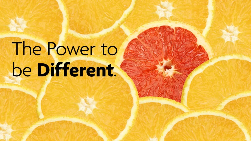 Digital ad reading The Power to be Different, a red grapefruit slice among orange slices