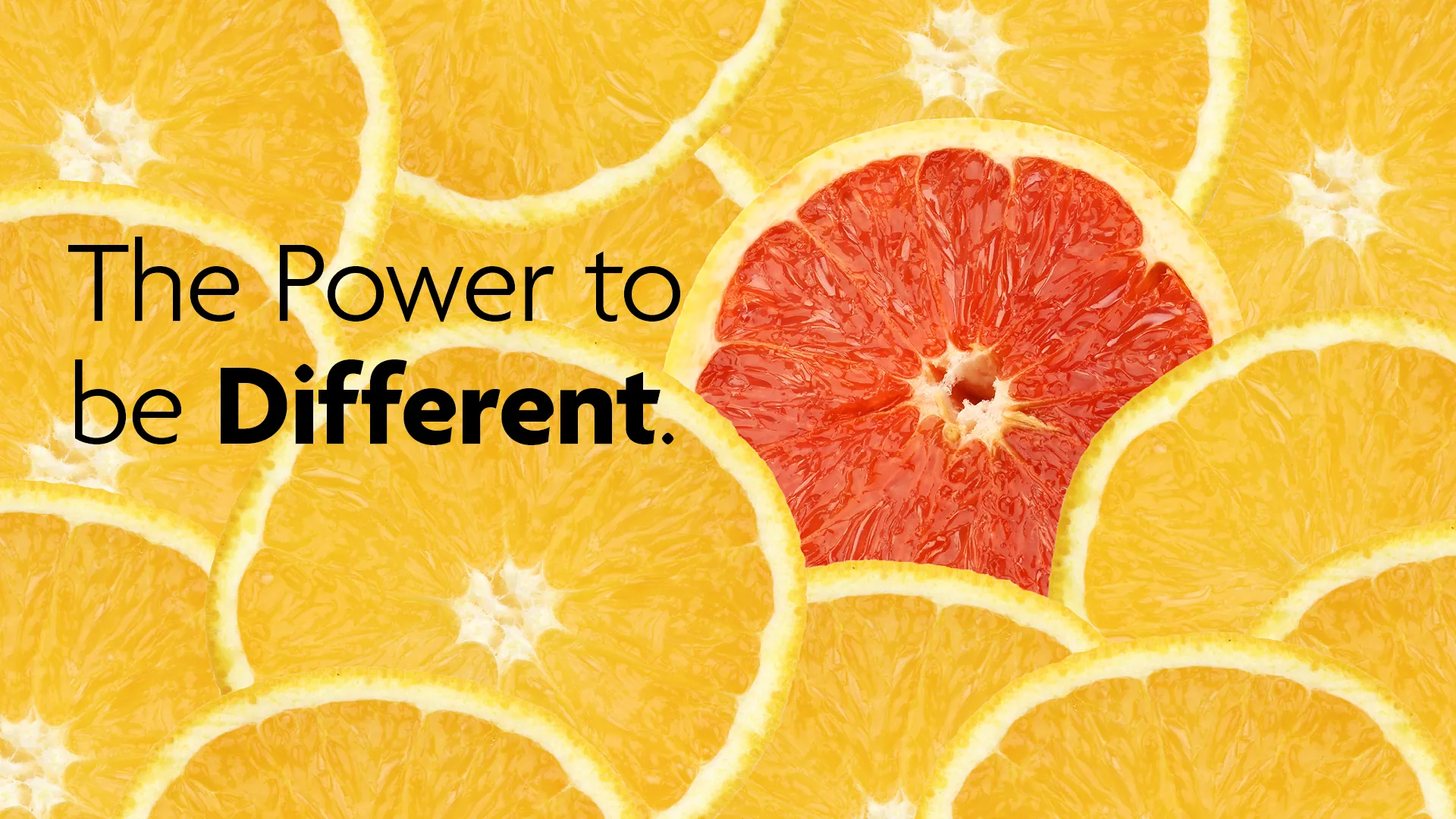Digital ad reading The Power to be Different, a red grapefruit slice among orange slices
