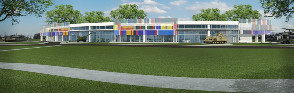Rendering of a low modern building with colorful panels beyond a grass lawn