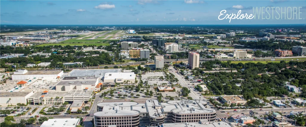 Aerial view of the Westshore district in Tampa with Explore Westshore text