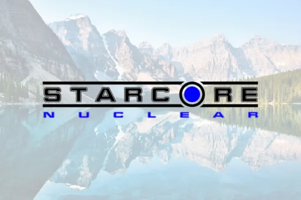 StarCore Nuclear logo over a faded mountain lake photo