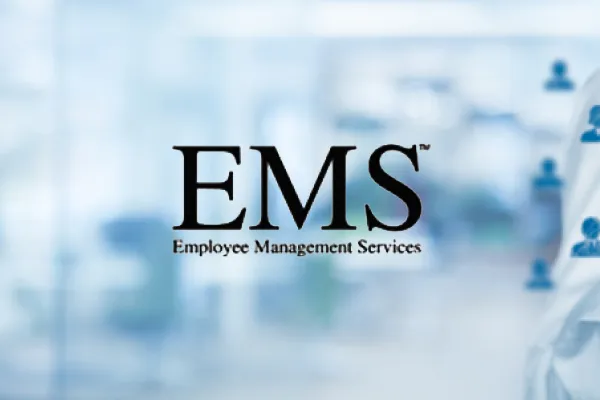 EMS Employee Management Services logo over a blurred office background