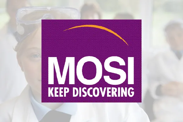 MOSI Keep Discovering logo over a faded photo of children in lab coats
