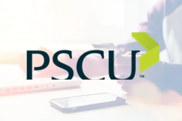 PSCU logo over a faded photo of a phone and papers