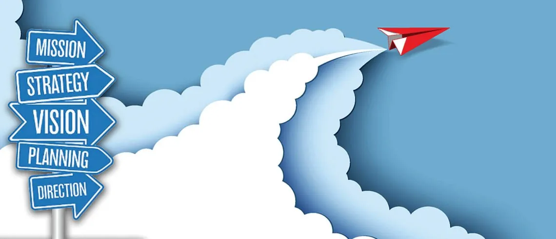 Signpost labeled Mission, Strategy, Vision, Planning, Direction beside a paper airplane and clouds