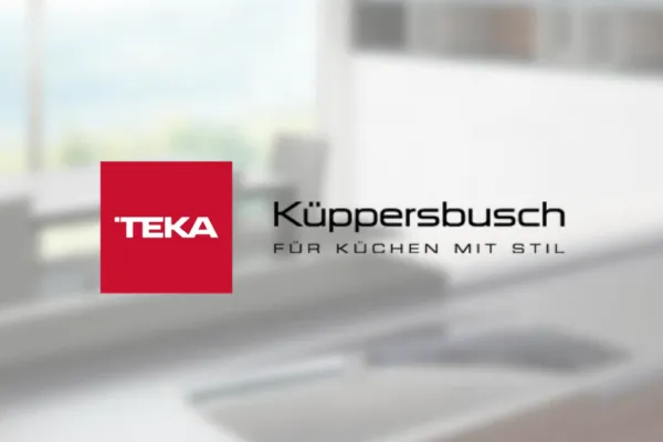 TEKA and Kuppersbusch kitchen appliance logos over a blurred kitchen