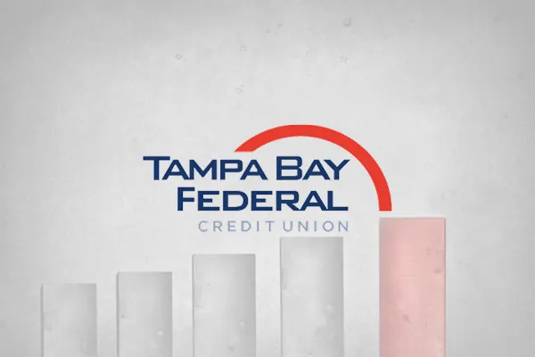 Tampa Bay Federal Credit Union logo over a rising bar chart