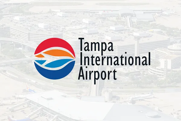 Tampa International Airport logo over a faded aerial airport photo