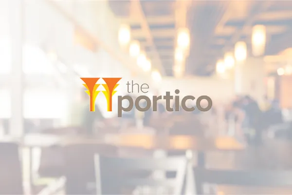 The Portico logo over a blurred restaurant interior