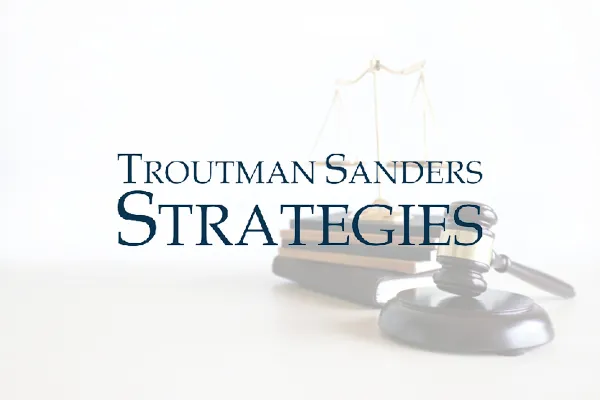 Troutman Sanders Strategies logo over a gavel and scales