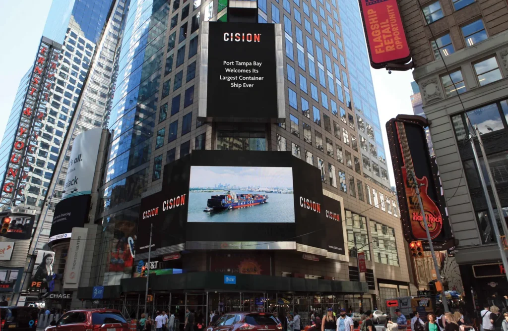 Times Square screens showing the CMA CGM ship: Port Tampa Bay Welcomes Its Largest Container Ship Ever