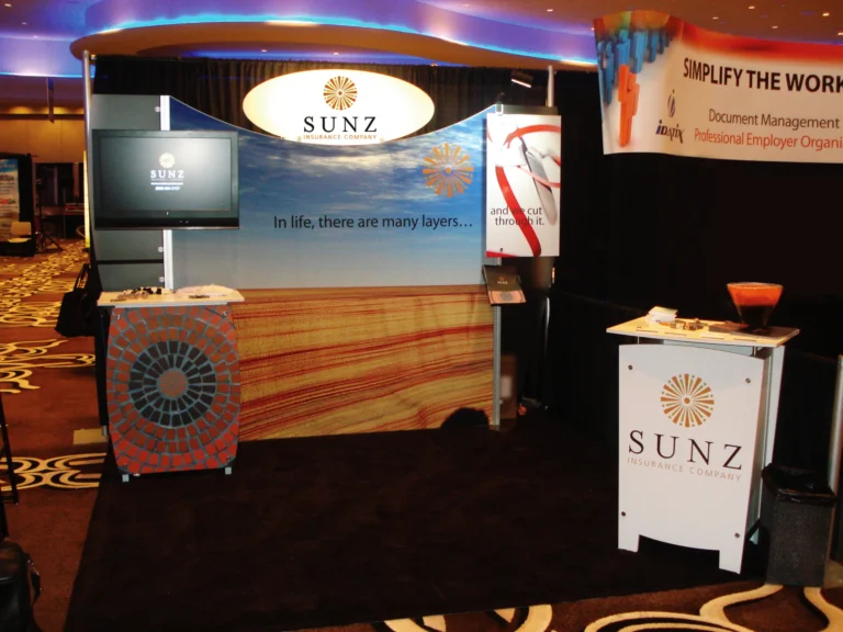 Sunz 10x10 trade show booth with counter and printed panels