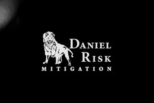 Daniel Risk Mitigation logo with lion on a black background
