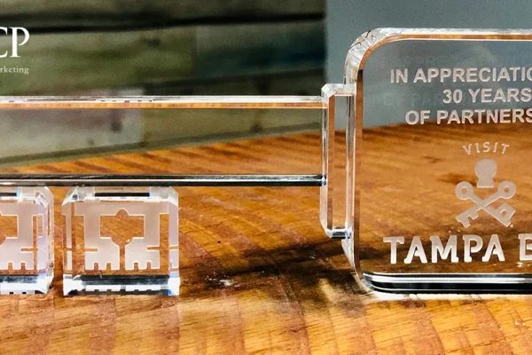 Crystal key award reading In Appreciation of 30 Years of Partnership, Visit Tampa Bay