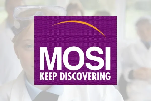 MOSI Keep Discovering logo over a faded photo of children in lab coats