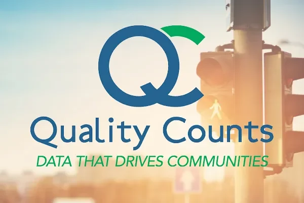 Quality Counts logo, Data That Drives Communities, with a traffic light
