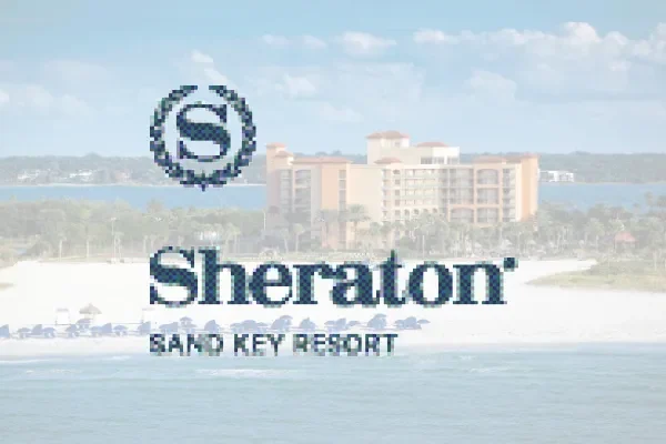 Sheraton Sand Key Resort logo over a beachfront resort photo