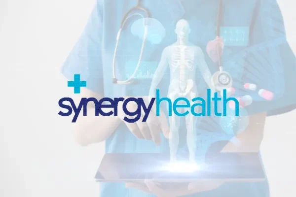 Synergy Health logo over a doctor holding a digital body scan