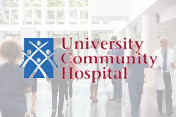 University Community Hospital logo over a faded hospital lobby photo