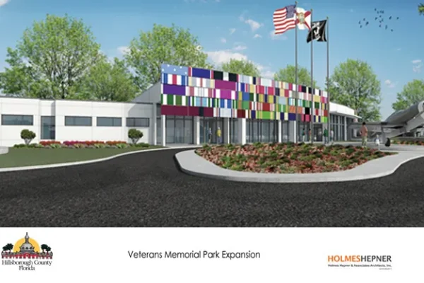 Concept drawing of the Veterans Memorial Park Expansion with a white building and flagpoles
