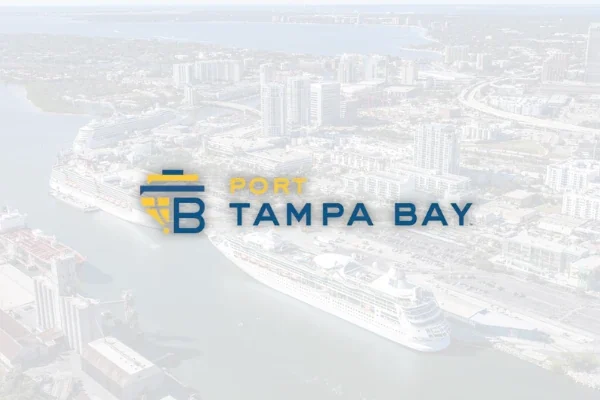 Port Tampa Bay logo faded over an aerial photo of the port